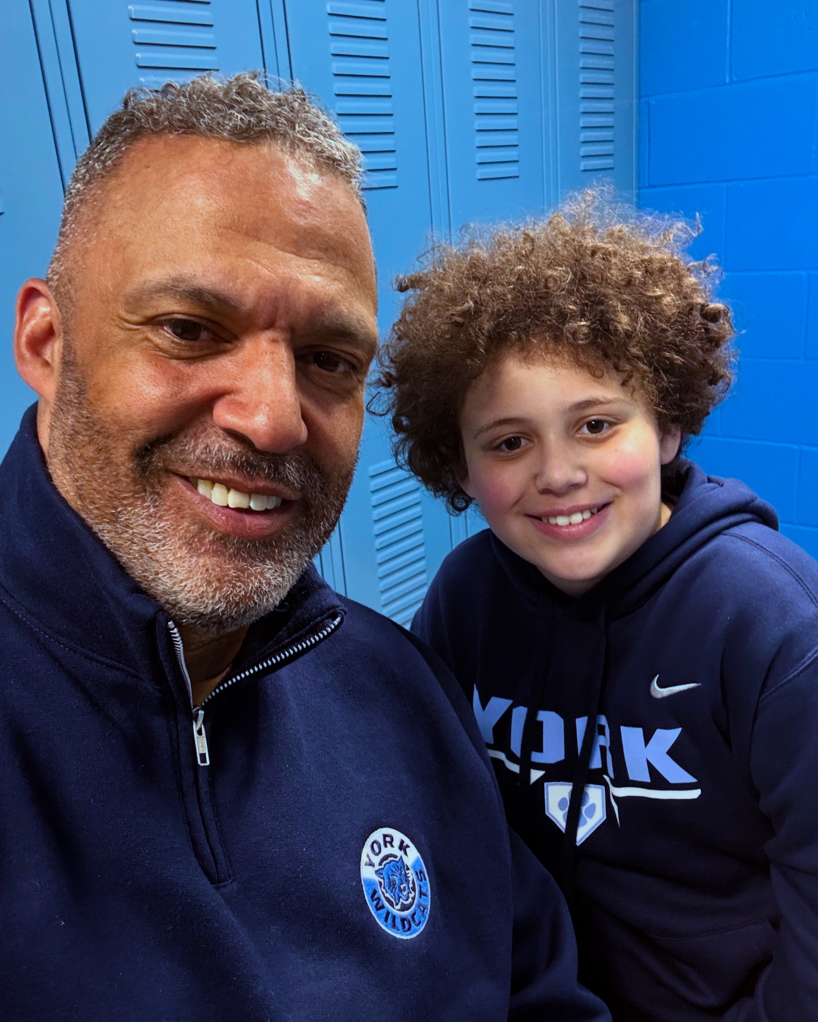 Coach Joshua Guptel with his younger son