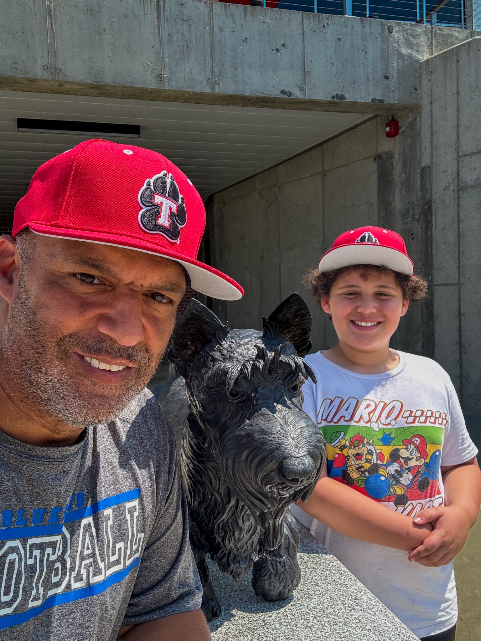 Coach Joshua Guptel with his younger son
